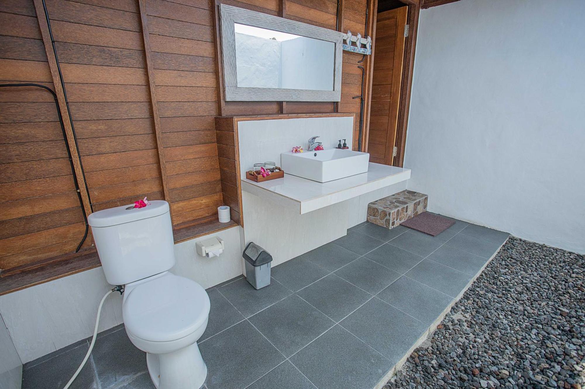 Отель Lembongan Mantra Huts Экстерьер фото